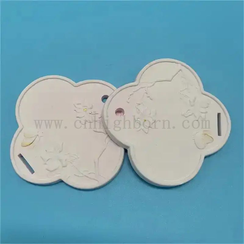 Modèle exquis blanc personnalisé Arôme Diffuseur Pendant Plaque en pierre en céramique