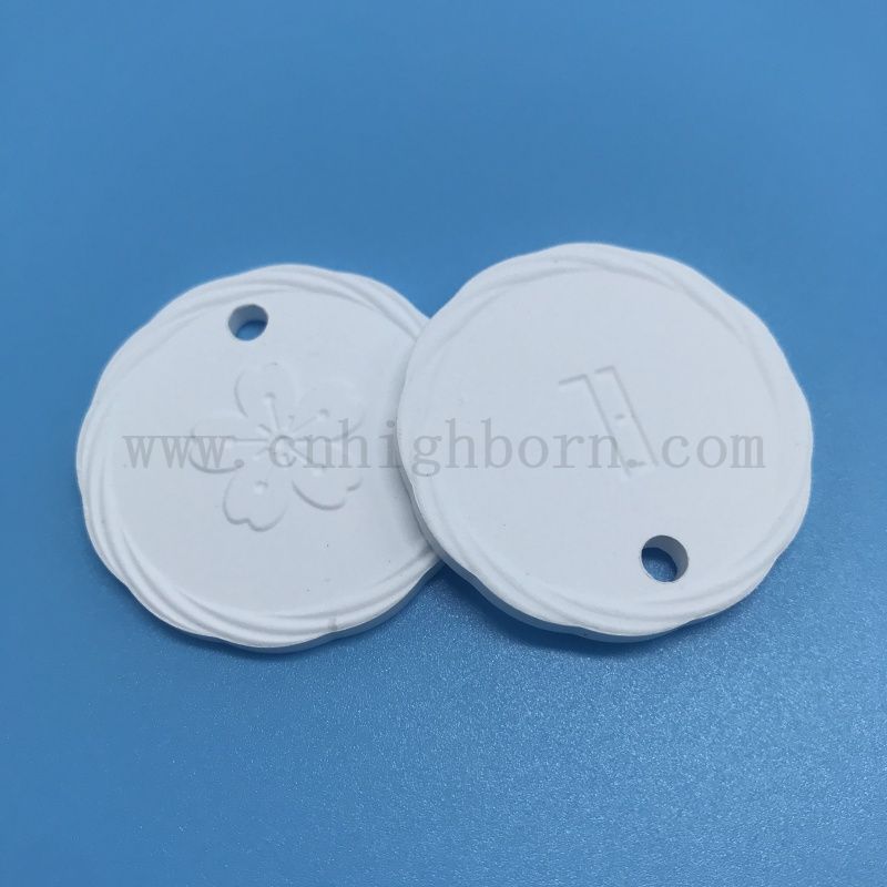 Plaque suspendue de diffuseur d'arome de pierre parfumée en céramique poreuse d'argile de logo de double côté