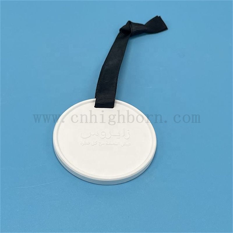 Arôme de logo en relief personnalisé Diffuseur suspendu pierre parfumée avec ruban