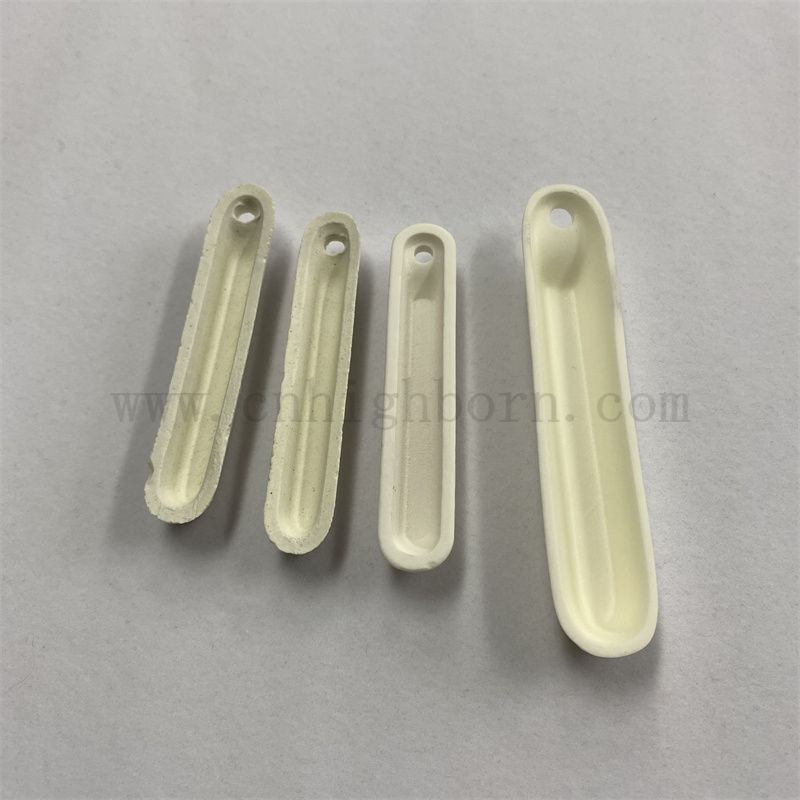 Boat en porcelaine d'alumine de haute pureté à haute température à haute température avec un trou avec un trou